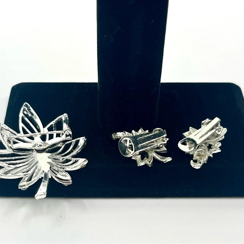 Vintage blue rhinestone butterfly brooch with matching clip earrings silver tone